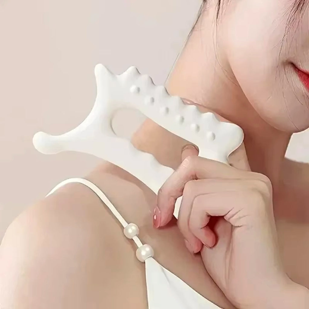 Contour gua sha board in hand