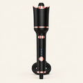 Swirl auto-rotating ceramic curler in black and rose gold