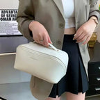 Vanity carried by hand